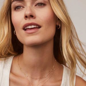 Tiny Bow 14k Yellow Gold Pendant Necklace in White Diamond - alternate view