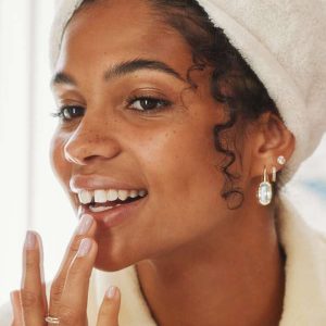 Virginia 18k Gold Vermeil Huggie Earrings in White Topaz - view 2